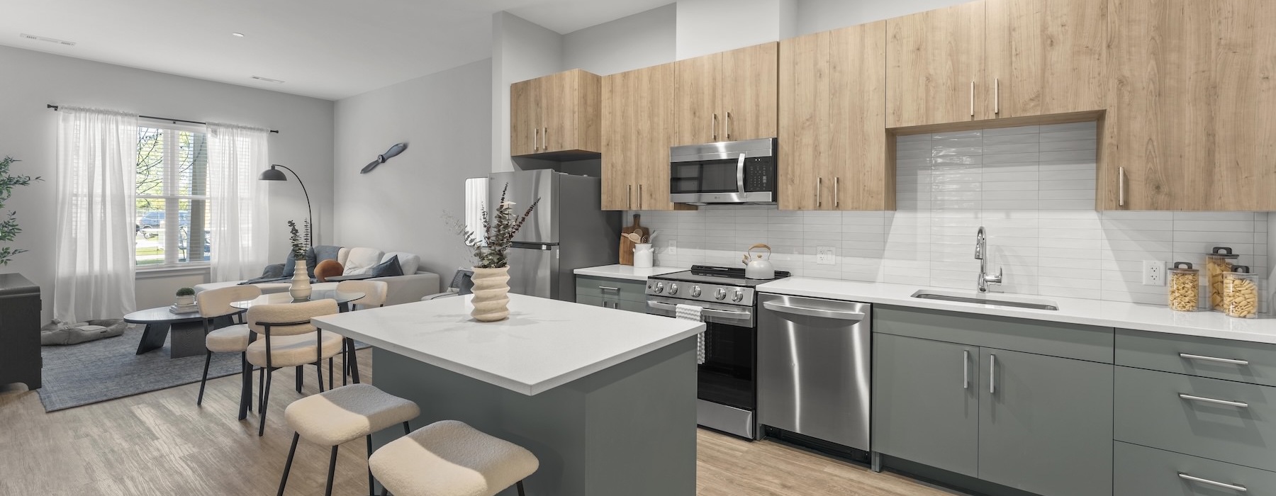a kitchen with a bar stools