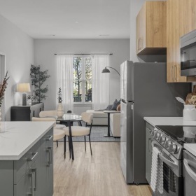 a kitchen with wood cabinets